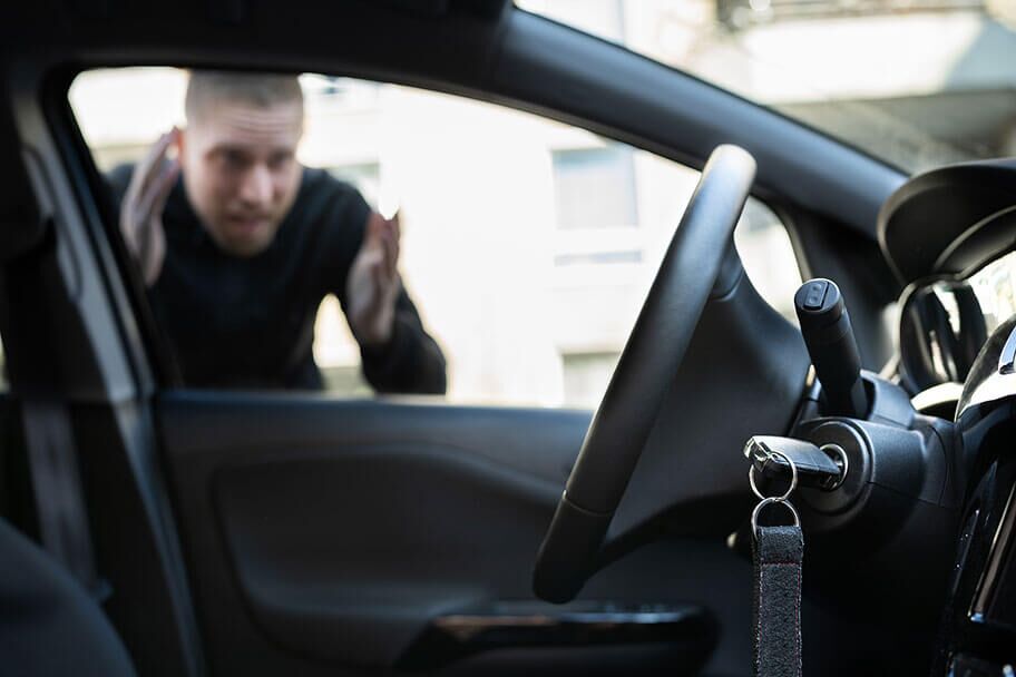 A man locked out, keys left inside the car